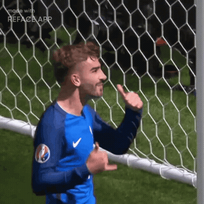 A Soccer Player Is Giving A Thumbs Up In Front Of A Net GIF
