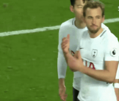 A Soccer Player Is Giving A Thumbs Up Sign While Standing On A Field . GIF