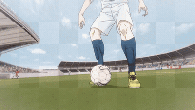 A Soccer Player Is Kicking A Ball In A Stadium With A Motul Ad GIF