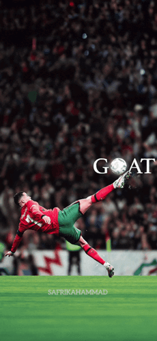 A Soccer Player Is Kicking A Ball With The Word Goat Written On The Bottom GIF