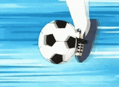 A Soccer Player Is Kicking A Soccer Ball In The Air . GIF