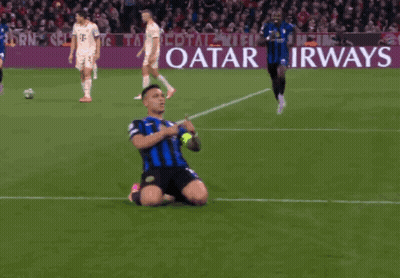 A Soccer Player Is Kneeling On The Field In Front Of A Qatar Airways Banner GIF