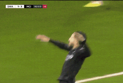 A Soccer Player Is Laying On The Field With The Score 1-2 GIF