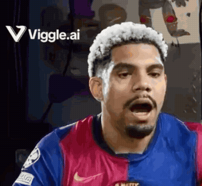 A Soccer Player Is Making A Funny Face With His Mouth Open While Wearing A Nike Jersey . GIF