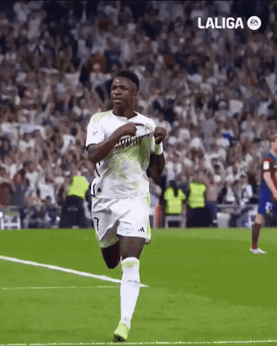 A Soccer Player Is Running On A Field With A Laliga Logo In The Background GIF
