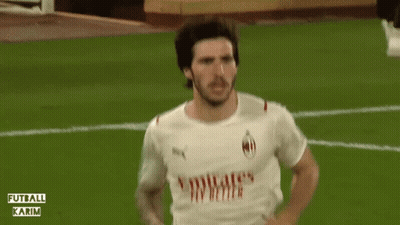 A Soccer Player Is Running On A Field With The Words Futball Karim Behind Him GIF