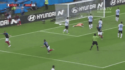 A Soccer Player Is Running Towards A Goal During A Game . GIF