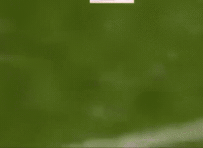 A Soccer Player Is Running Towards A Goal With Dhl Advertisements In The Background GIF