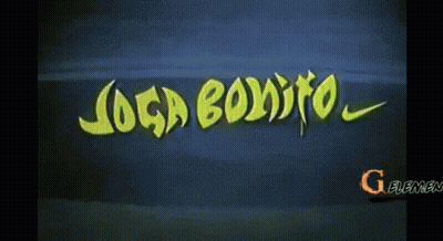 A Soccer Player Is Sitting On The Field Wearing A Yellow Jersey With The Letter G On The Sleeve GIF