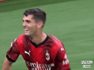 A Soccer Player Is Wearing A Red Emirates Shirt GIF