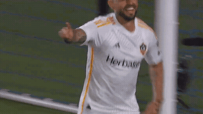 A Soccer Player Is Wearing A Shirt That Says Herbalife On It GIF