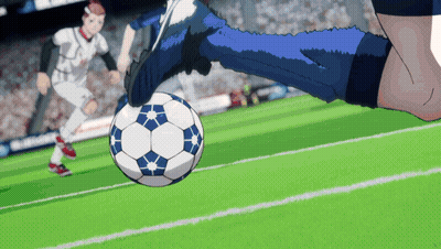 A Soccer Player Kicking A Ball On A Field With A Crowd In The Background GIF