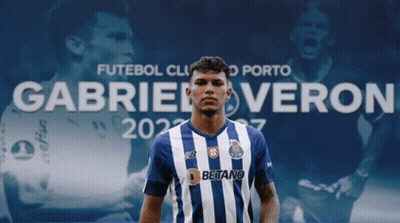 A Soccer Player Named Gabriel Veron Stands In Front Of A Poster GIF