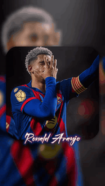 A Soccer Player Named Ronald Araujo Is Wearing A Blue And Red Jersey GIF