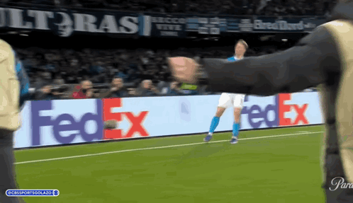A Soccer Player On A Field With A Fedex Sign In The Background GIF