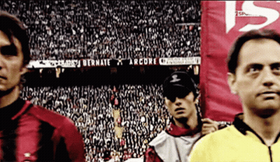 A Soccer Player Stands In Front Of A Banner That Says Bernate On It GIF
