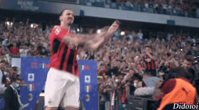 A Soccer Player Stands In Front Of A Crowd With The Word Didioi On The Bottom Right Corner GIF