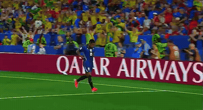 A Soccer Player Stands In Front Of A Lenovo Ad GIF