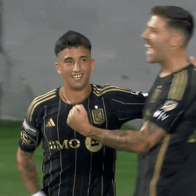 A Soccer Player Wearing A Black And Gold Jersey With Bmc On It GIF