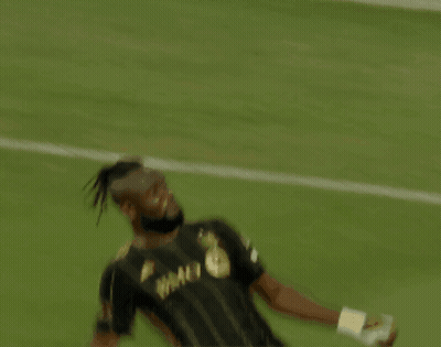 A Soccer Player Wearing A Black And Gold Shirt That Says Bmo On It GIF
