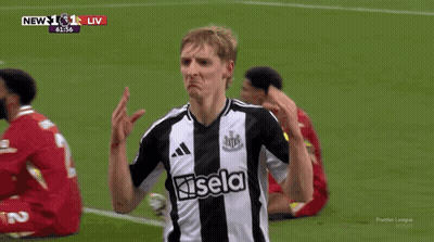 A Soccer Player Wearing A Black And White Jersey That Says Igol GIF