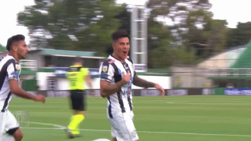A Soccer Player Wearing A Black And White Jersey With A Sticker That Says ' A ' On It GIF
