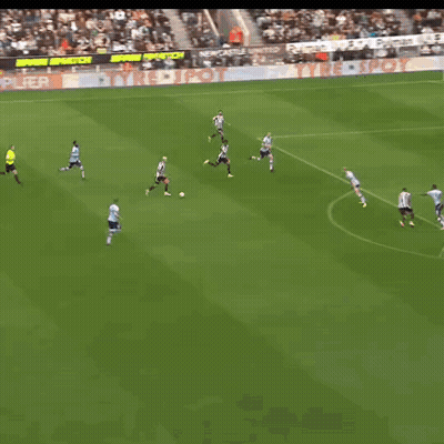 A Soccer Player Wearing A Black And White Striped Jersey With The Word United On The Front GIF