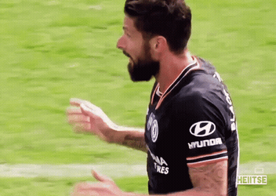 A Soccer Player Wearing A Black Shirt With Hyundai Tires On The Sleeves GIF