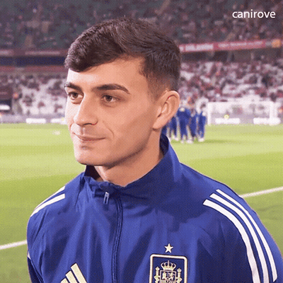 A Soccer Player Wearing A Blue Adidas Jacket With A Star On The Front GIF