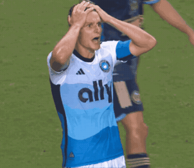 A Soccer Player Wearing A Blue And White Ally Jersey GIF