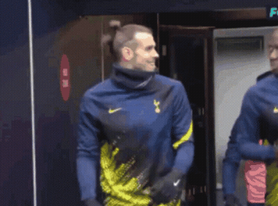 A Soccer Player Wearing A Blue And Yellow Nike Shirt GIF