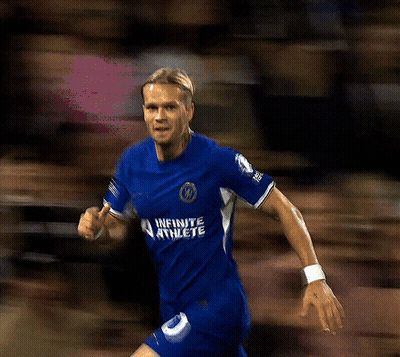 A Soccer Player Wearing A Blue Jersey That Says Infinite Athlete On It GIF