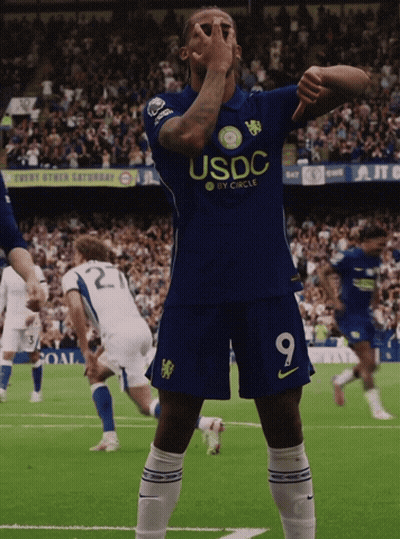 A Soccer Player Wearing A Blue Jersey That Says Usdc GIF