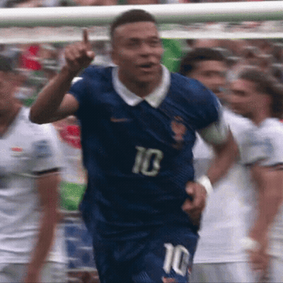 A Soccer Player Wearing A Blue Jersey With The Number 10 GIF