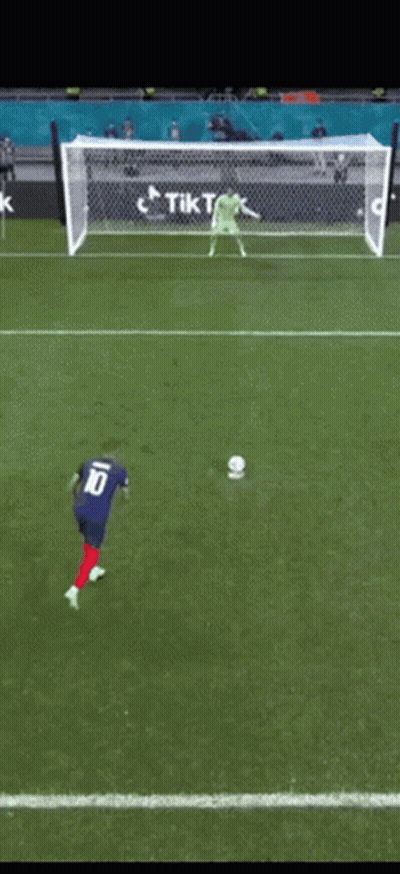 A Soccer Player Wearing A Blue Jersey With The Number 10 On The Back GIF