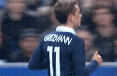 A Soccer Player Wearing A Blue Jersey With The Number 11 On It GIF