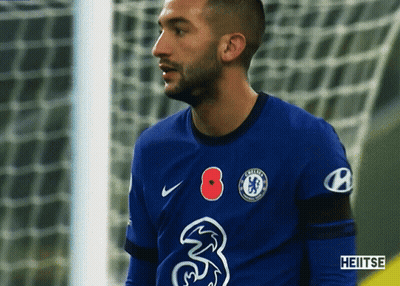 A Soccer Player Wearing A Blue Jersey With The Number 3 On It GIF