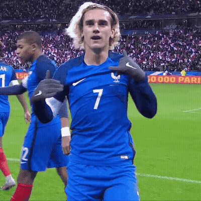 A Soccer Player Wearing A Blue Jersey With The Number 7 GIF