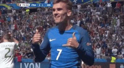 A Soccer Player Wearing A Blue Jersey With The Number 7 On It GIF