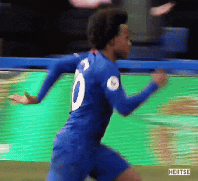A Soccer Player Wearing A Blue Jersey With The Number 8 On It GIF