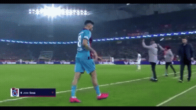 A Soccer Player Wearing A Blue Jersey With The Number 8 On It GIF