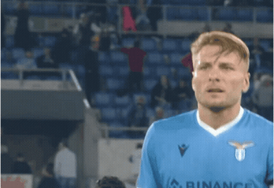 A Soccer Player Wearing A Blue Jersey With The Word Binance On It GIF