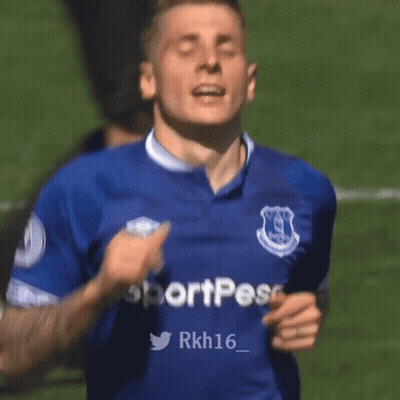A Soccer Player Wearing A Blue Jersey With The Word Sport On The Sleeves GIF