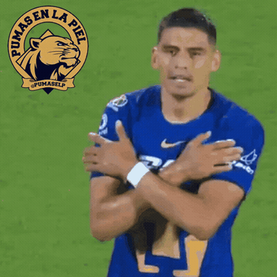 A Soccer Player Wearing A Blue Pumas En La Piel Shirt GIF