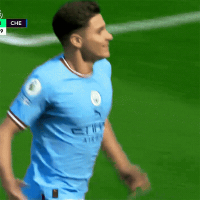 A Soccer Player Wearing A Blue Shirt That Says City GIF
