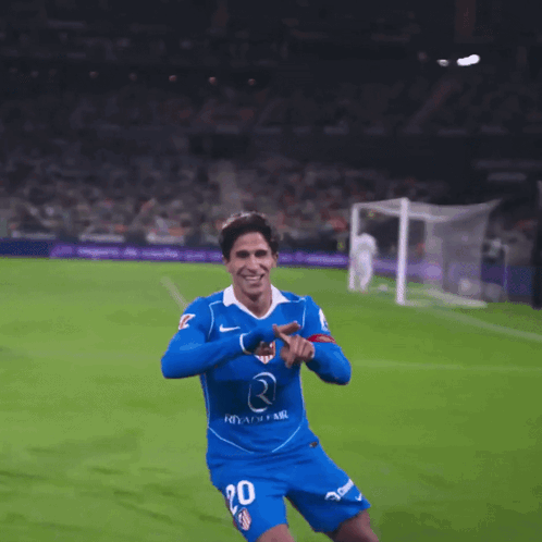 A Soccer Player Wearing A Blue Shirt That Says ' Radh Air ' On It GIF