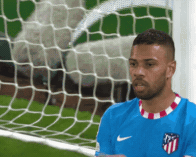 A Soccer Player Wearing A Blue Shirt With A Red White And Blue Logo GIF