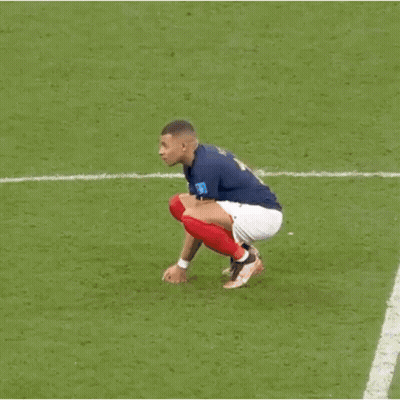 A Soccer Player Wearing A Blue Shirt With The Number 10 On It Is Standing On A Field . GIF