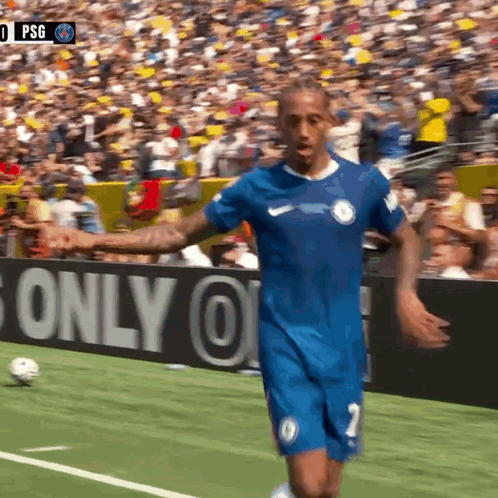 A Soccer Player Wearing A Blue Shirt With The Number 7 On It GIF