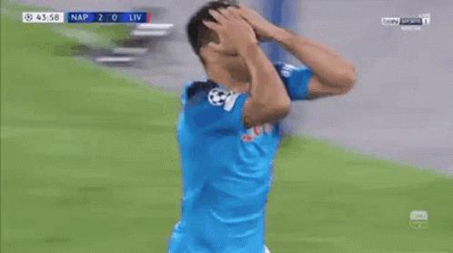 A Soccer Player Wearing A Blue Shirt With The Word Lete On It Is Celebrating A Goal . GIF